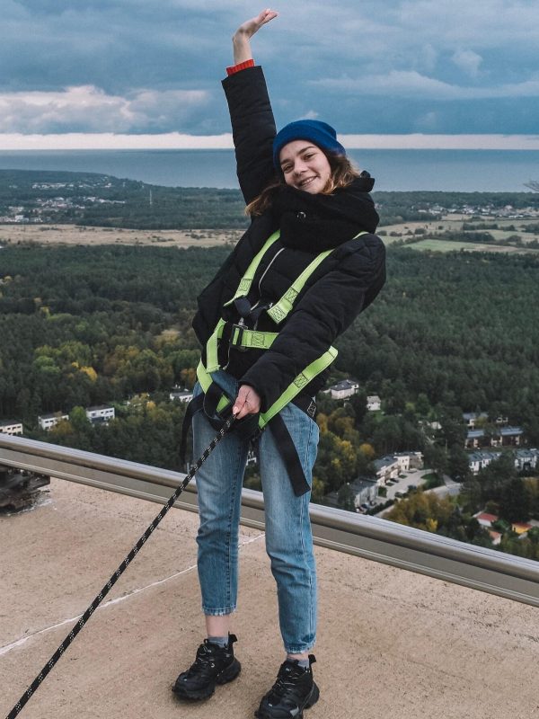 a-young-woman-walking-on-the-roof-1.jpg a-young-woman-walking-on-the-roof-1.jpg